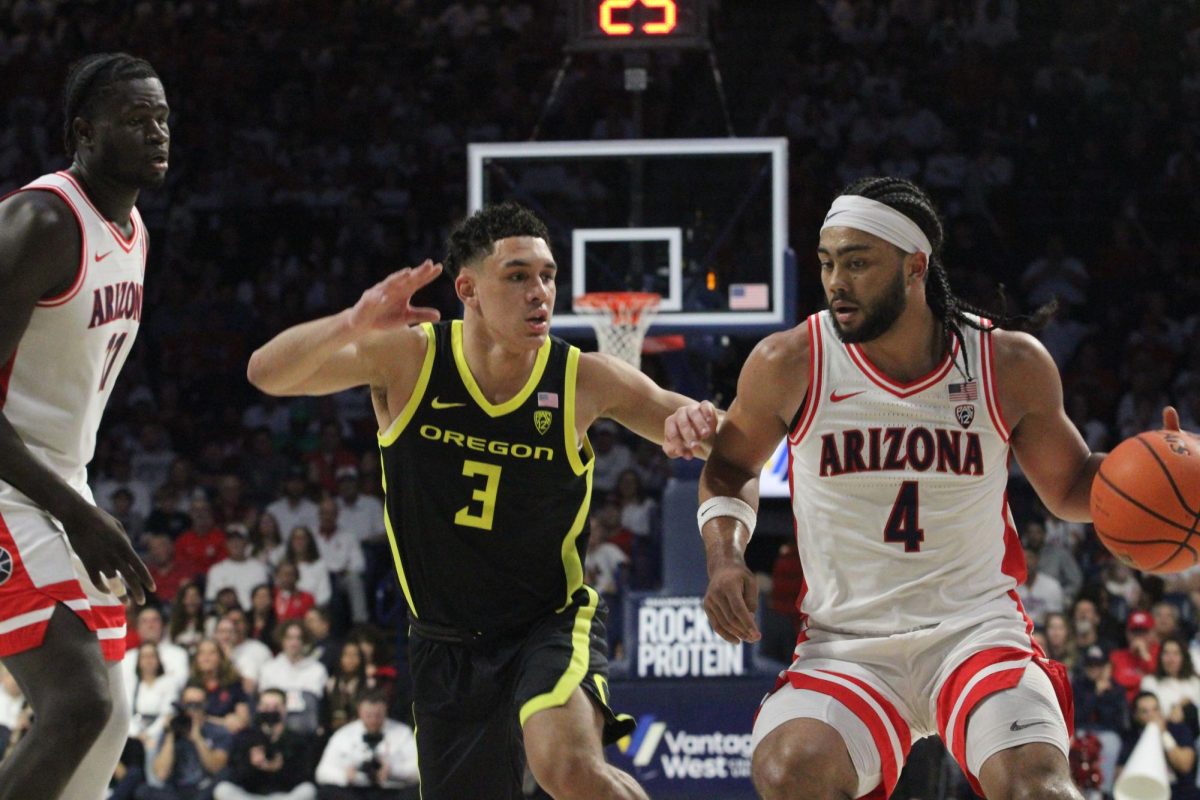 Arizona's Kylan Boswell and Oumar Ballo playing against Oregon during the senior day basketball game on March 2 in McKale Center. UA beat Oregon by 20 points. 