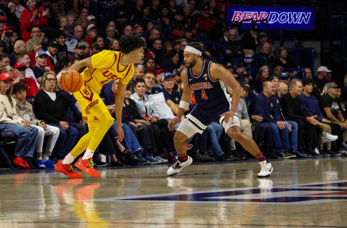 Arizonas Kylan Boswell (4) is on the defense in UAs game against USC on Wednesday, Jan. 17.  The game ended in an 82-67 point win for the Wildcats.