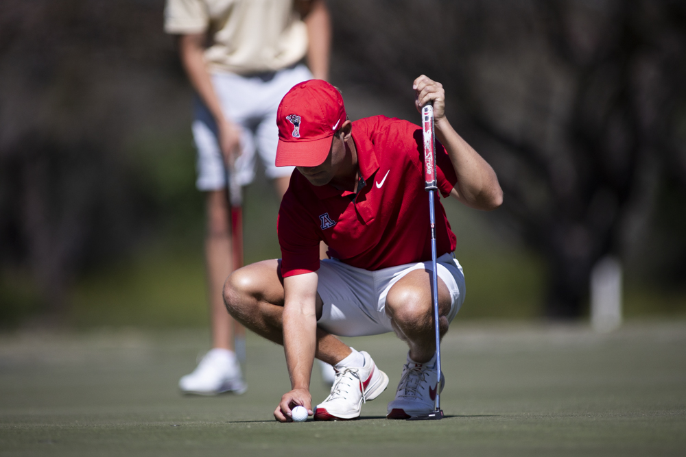 Arizona's Sam Sommerhauser is locked in and setting up his golf ball during the Arizona Thunderbird Intercollegiate Tournament on March 19 at the Tucson Country Club. Sommerhauser finished in third place.