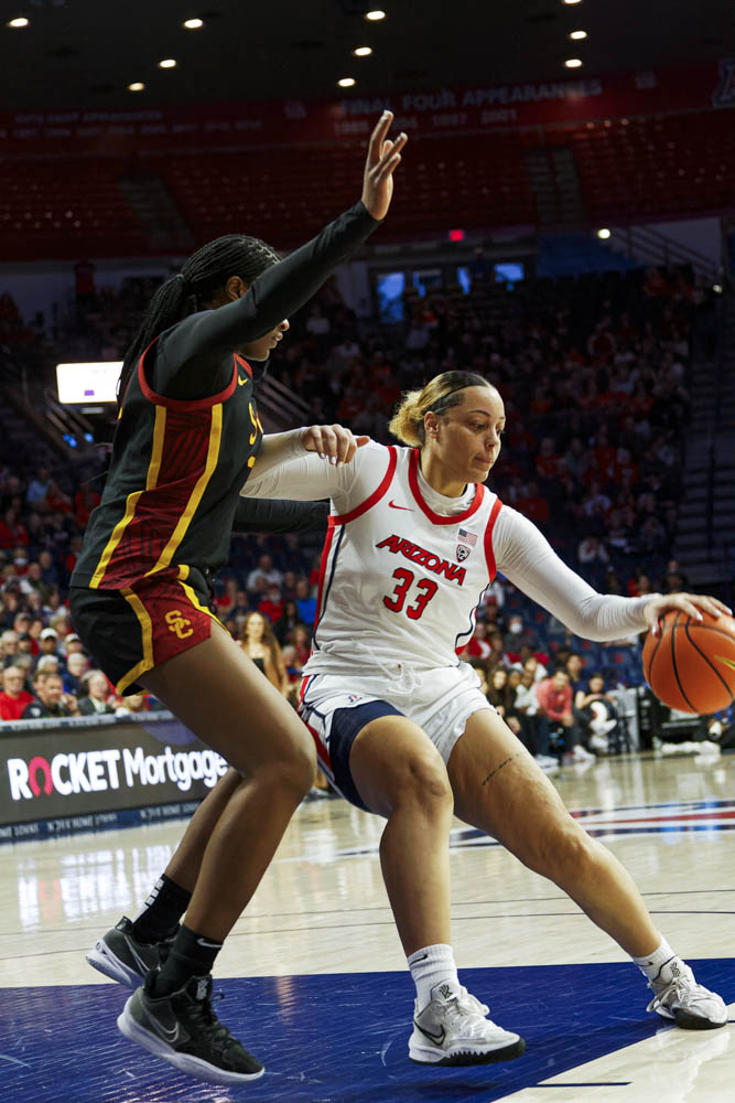 Arizonas Isis Beh dribbling the ball to shoot during game against USC Trojans February 29th in Mckale Center. Wildcats taking the loss with a final score of 95-93.