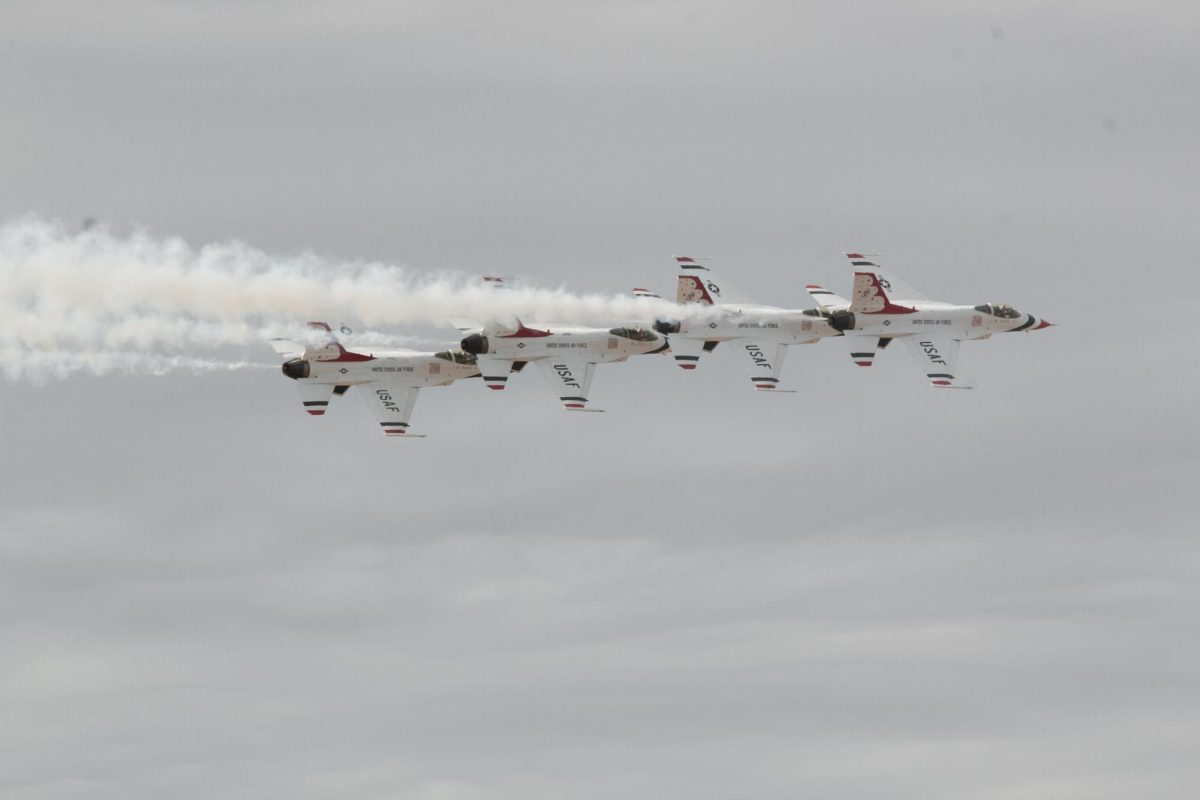 Four F-16s of the Thunderbirds fly in a line during the Luke Days air show on March 23 at Luke Air Force Base in Glendale, Ariz. This formation is a prelude to fanning out into a close diamond formation.
