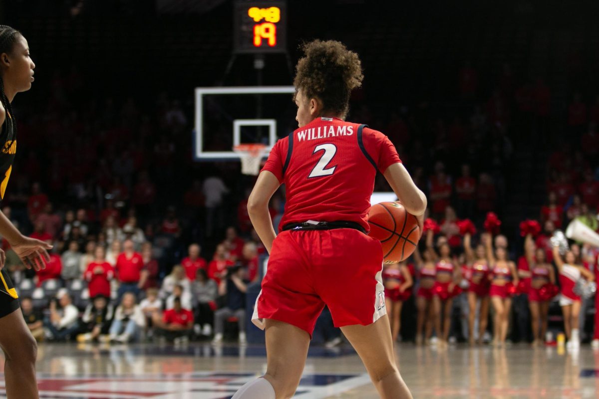 Jada Williams puts the ball into play during the game against the Sun Devils in the McKale Center on Feb. 4. Williams scored 4 points and 2 assists.