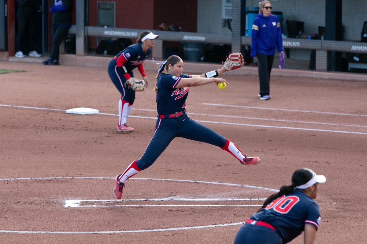 Miranda Stoddard throws a pitch in the first inning of Arizona’s game against Washington at Rita Hillenbrand Stadium on March 16. Opening with an impressive first inning, the Washington Huskies quickly began stacking up runs.

