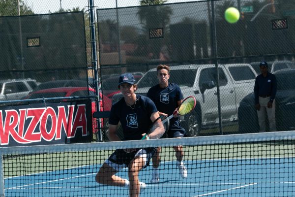 Sasha Rozin and Gustaf Strom return the ball from an ASU pair during the doubles stage of their game on April 7 at Robson Tennis Center. The Pair defeated their ASU counterparts with a score of 6-2.