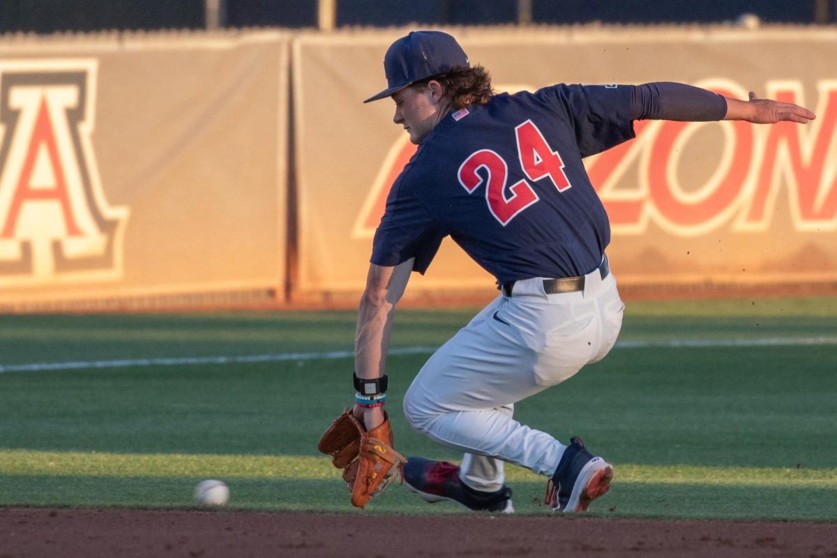 Arizona+baseballs+Mason+White+fields+a+ground+ball+in+a+game+against+New+Mexico+State+University+on+Tuesday+April+2+at+Hi+Corbett+Field.+Arizona+won+the+game+in+the+top+of+the+ninth+inning+9-1.+