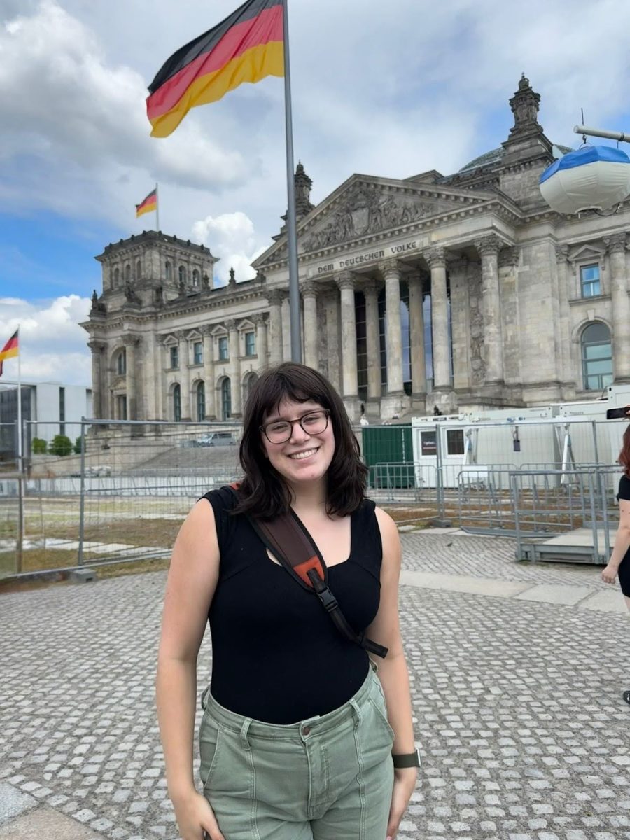 Reporter Emma LaPointe stands in front of the Reichstag government building in Berlin, Germany. 