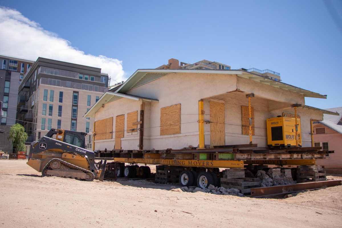 Historic homes at the intersection of Speedway and Euclid are being moved on Aug. 23 at the University of Arizona. The developers plan to add another highrise apartment complex for student housing on the newly cleared lot.