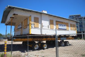 A historic Tucson home in the process of being moved out of the lot on the corner of Euclid
and Speedway on Sept. 4. The home is being moved out to make room for future student housing.