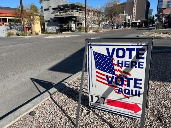 A sign points voters to First United Methodist Church on March 19. The church, adjacent to the University of Arizona campus, was open for the primary election this year.