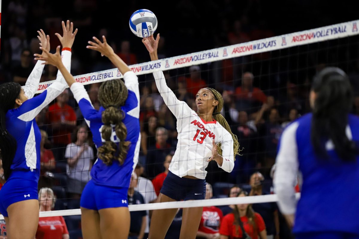 Adrianna Bridges attempts to float the ball over the net against Tennessee State on Sep. 1. in McKale Center. Bridges made her collegiate debut at the Cactus Classic.