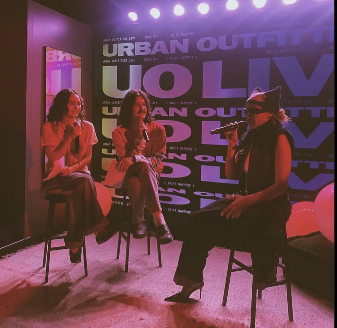 Enya Umanzor (left) and Drew Phillips (middle) interview musical artist Tinashe (right) at Urban Outfitters in Main Gate Square on Sept. 18.