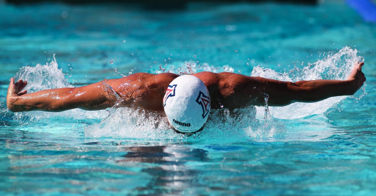 A male University of Arizona swimmer competes in a butterfly stroke event in a meet against the University of Utah on Oct. 26 at Rita Hillenbrad Aquatic Center. Arizona lost 159.50-140.50. 