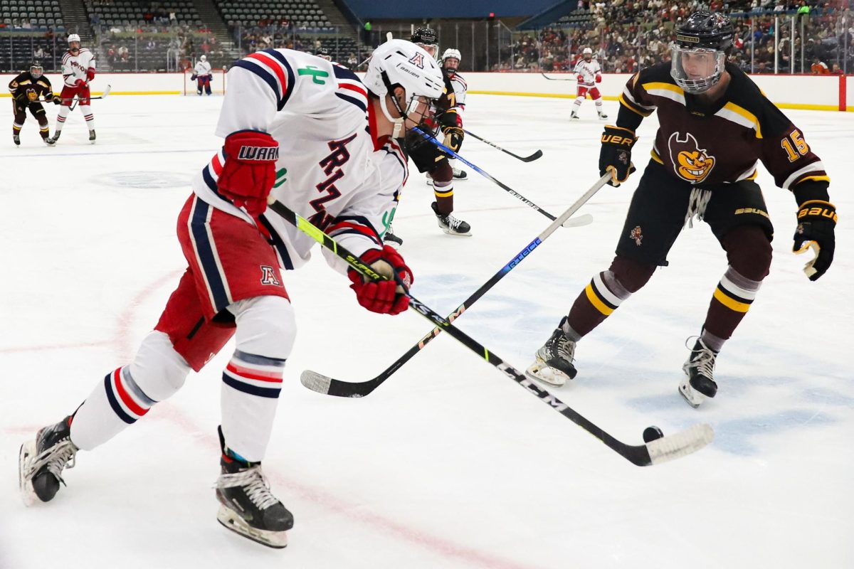 An Arizona hockey player attacks towards the goal against Arizona State University in Tucson Convention Center on Oct. 4. Arizona would win 3-0.