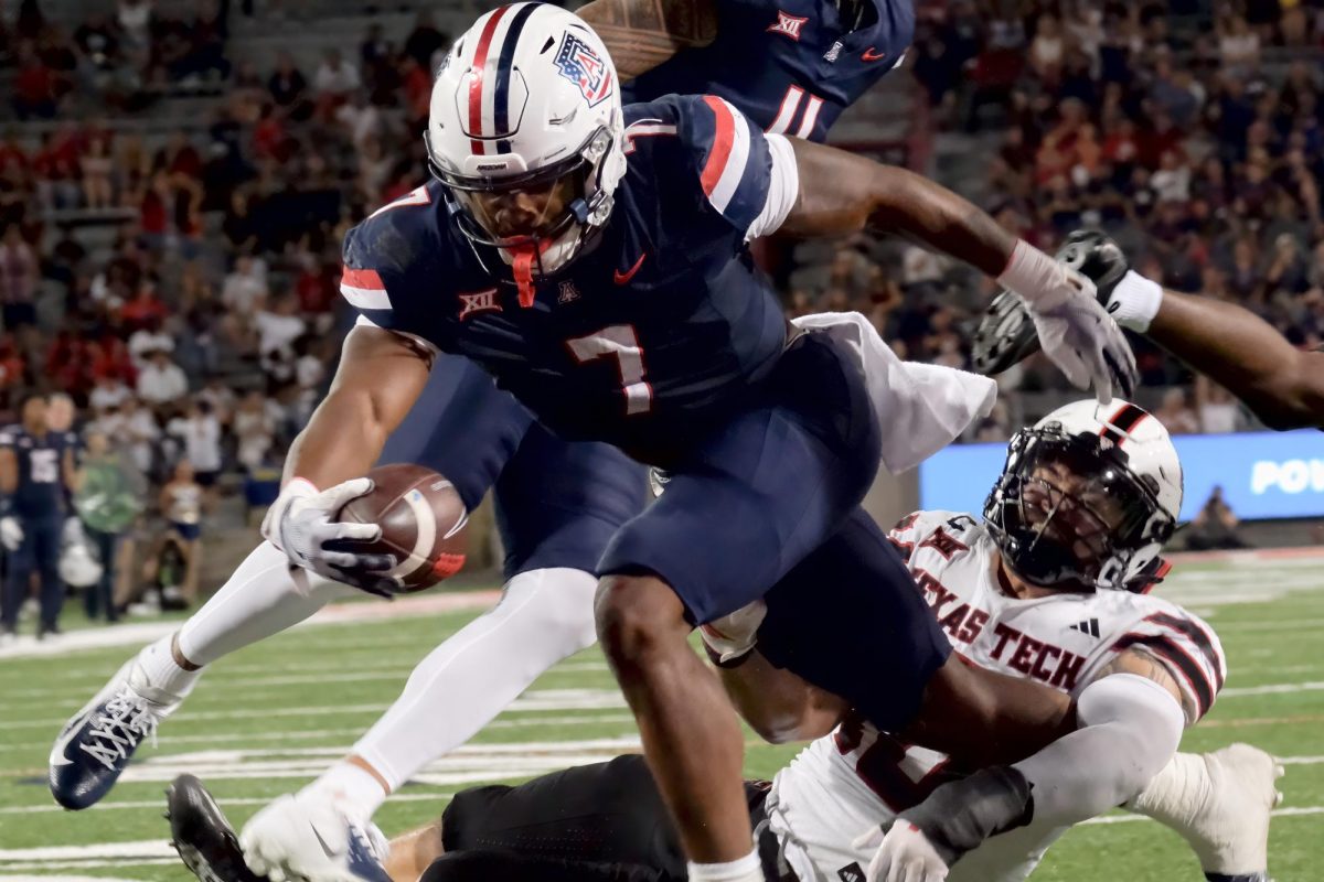 Arizona running back Quali Conley makes a dash for the end zone during the Wildcats’ game against Texas Tech on Oct. 5 at Arizona Stadium. Conley scored the only Arizona touchdown during the game.