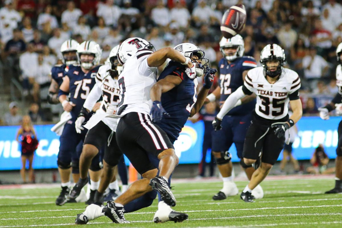 Montana Lemonious Craig gets a pass broken up by the Texas Tech defense at Arizona Stadium on Oct. 5.  Arizona was held to just one field goal in the first half.