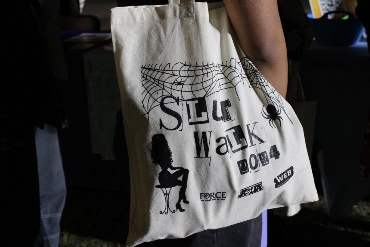 A tote bag reads "Slut Walk 2024" on Oct. 30. UAWEB was giving out Halloween-themed bags on the UA mall during the SlutWalk event.