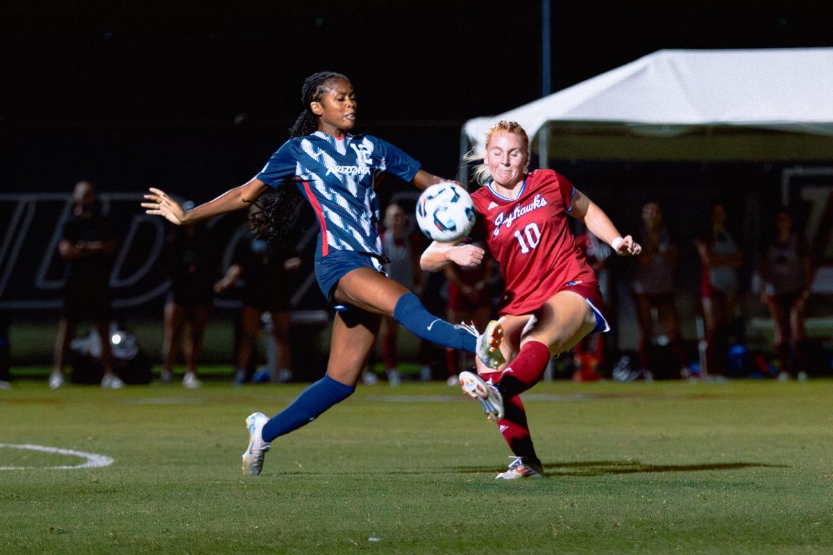 Arizona Wildcat's Aranda Hurge battles for the ball against the Kansas Jayhawks on Oct. 17 at Murphy Field. The Wildcats and Jayhawks battled for possession in the first half of the game.