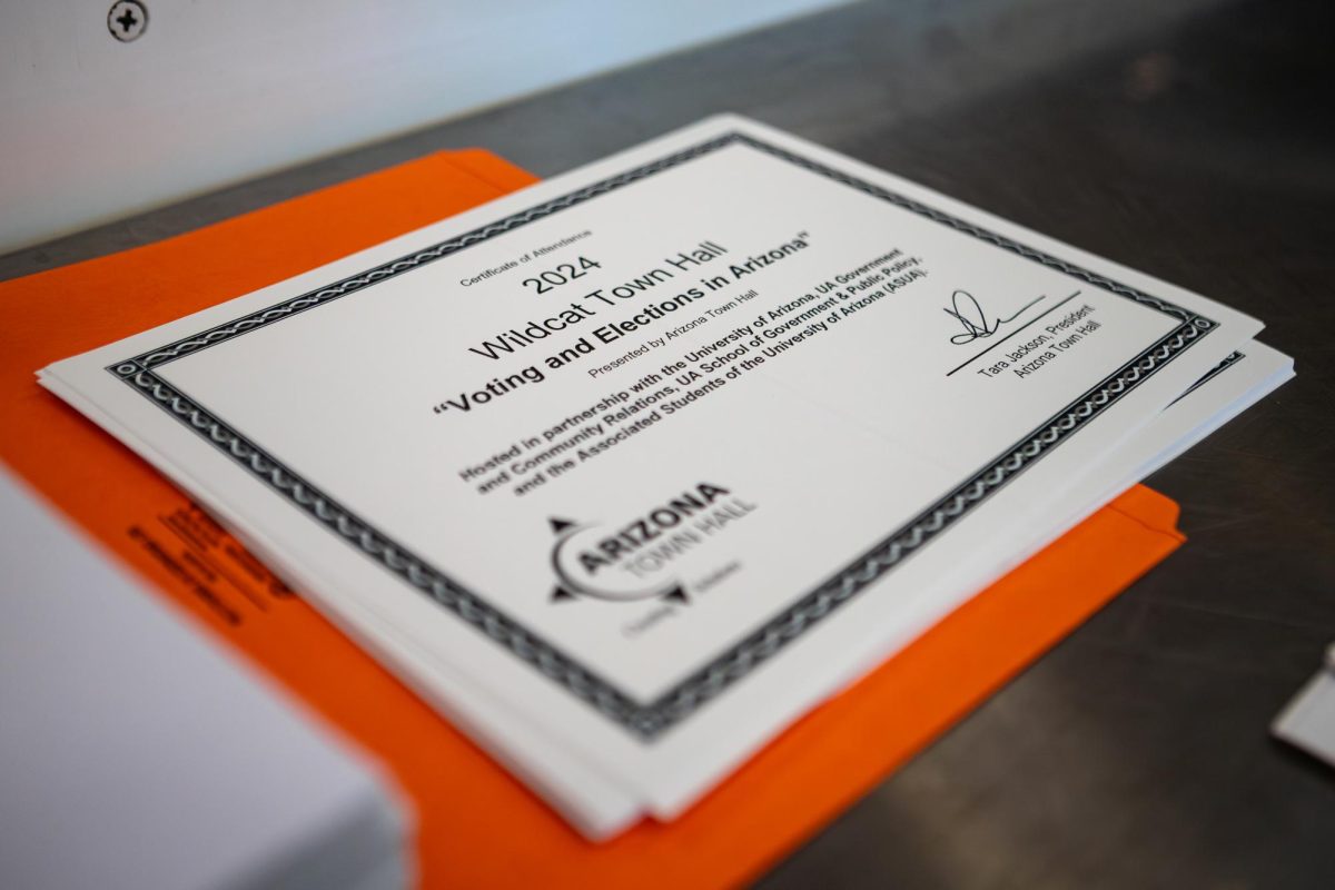 A stack of certificates of attendance at the ASUA town hall meeting on Oct. 17. "Arizona Town Hall is a nonpartisan, nonprofit organization that brings diverse people together to solve critical and often divisive policy issues," according to ASUA's website. 