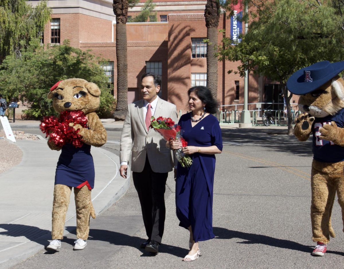 President Suresh Garimella walks towards Old Main with his wife, Mrs. Lakshmi Garimella for his welcome party on Oct. 2. Wilbur and Wilma led the couple to their welcome on the mall at around 10 a.m. on Oct. 2.