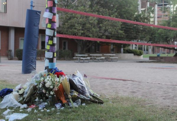 A memorial was set up for Minhaj Jamshidi at the volleyball court outside of Arizona Sonora Hall on Sept. 26. Jamshidi was shot on Sept. 22 while playing volleyball. 