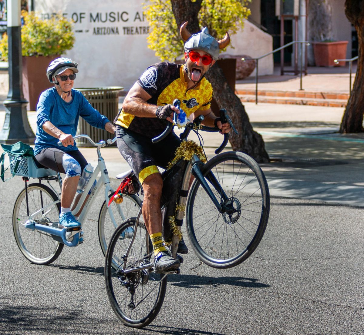 A biker pops a wheelie during Cyclovia's event in Downtown Tucson on Oct. 27. The block party featured a 2.25 mile route with plenty of activities throughout.