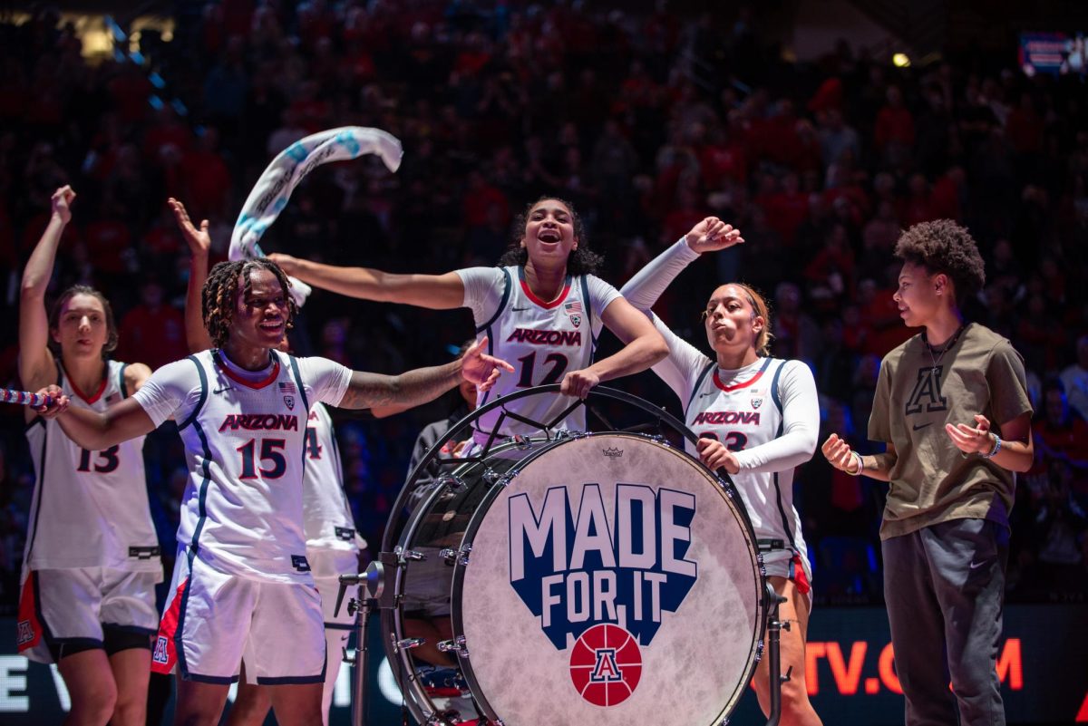 The Arizona women's basketball team continues the tradition of banging on the drum before a game against Loyola Marymount University on Sunday, Nov. 12, in McKale Center.
