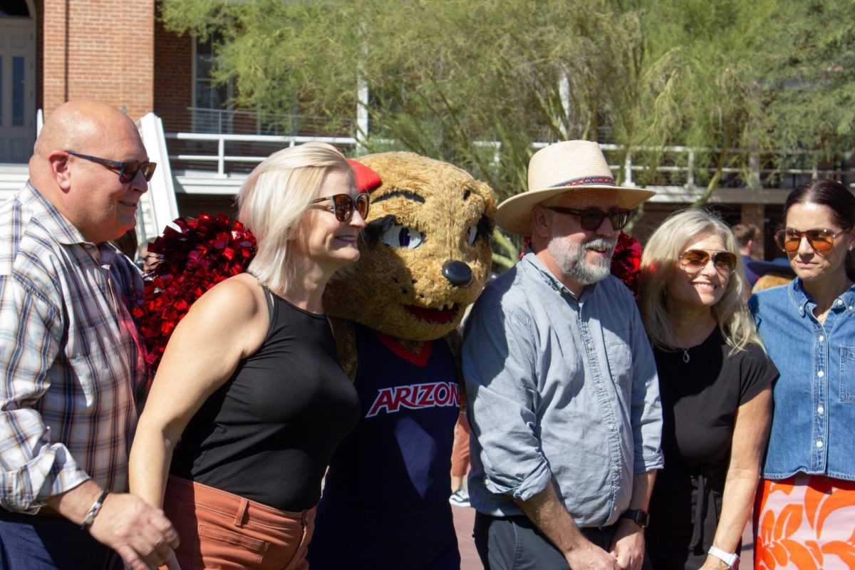 Wilma Wildcat poses with guests at President Suresh Garimella's welcome party at Old Main on Oct. 2. President Garimella gave a short speech at his welcome party before his first official day on campus.