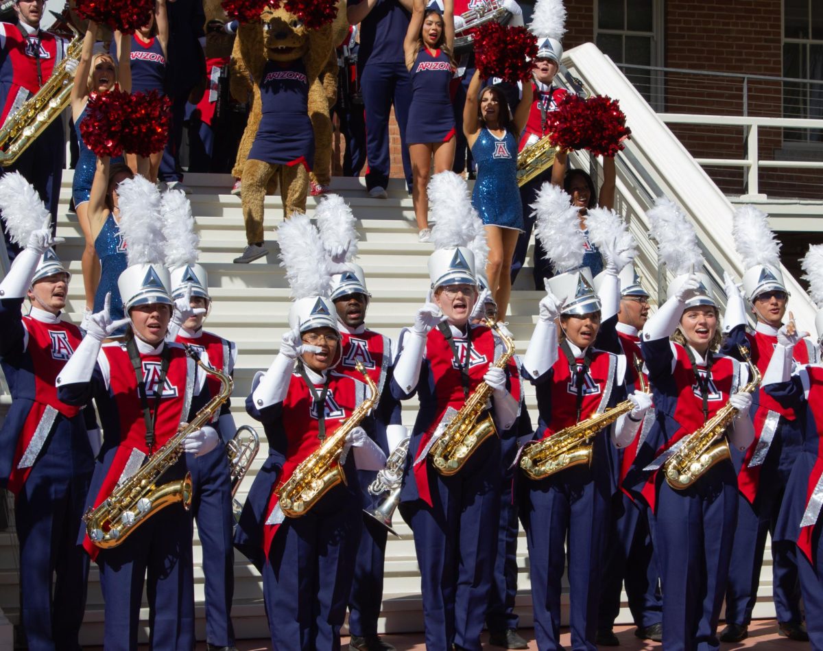 The wind instrument section of the Pride of Arizona chanting the Arizona fight song at President Garimella's welcome party on Oct. 2. President Garimella is the 23rd president of the University of Arizona.