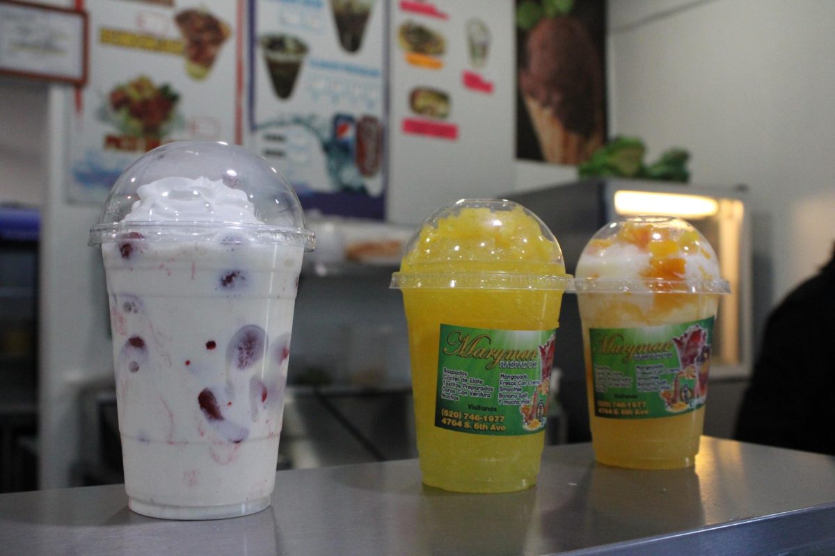 Three raspado drink orders are ready for pickup on Nov. 20 at the Marymar Raspados on 6th Avenue. The raspado flavors include piña fresca and fresas con crema.