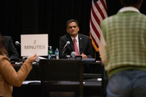 UA President Suresh Garimella and the Arizona Board of Regents listen to a student speak during an ABOR meeting on Nov. 21. Members of the public were invited to voice their concerns for a call to the audience in which they were given 3 minutes to speak.