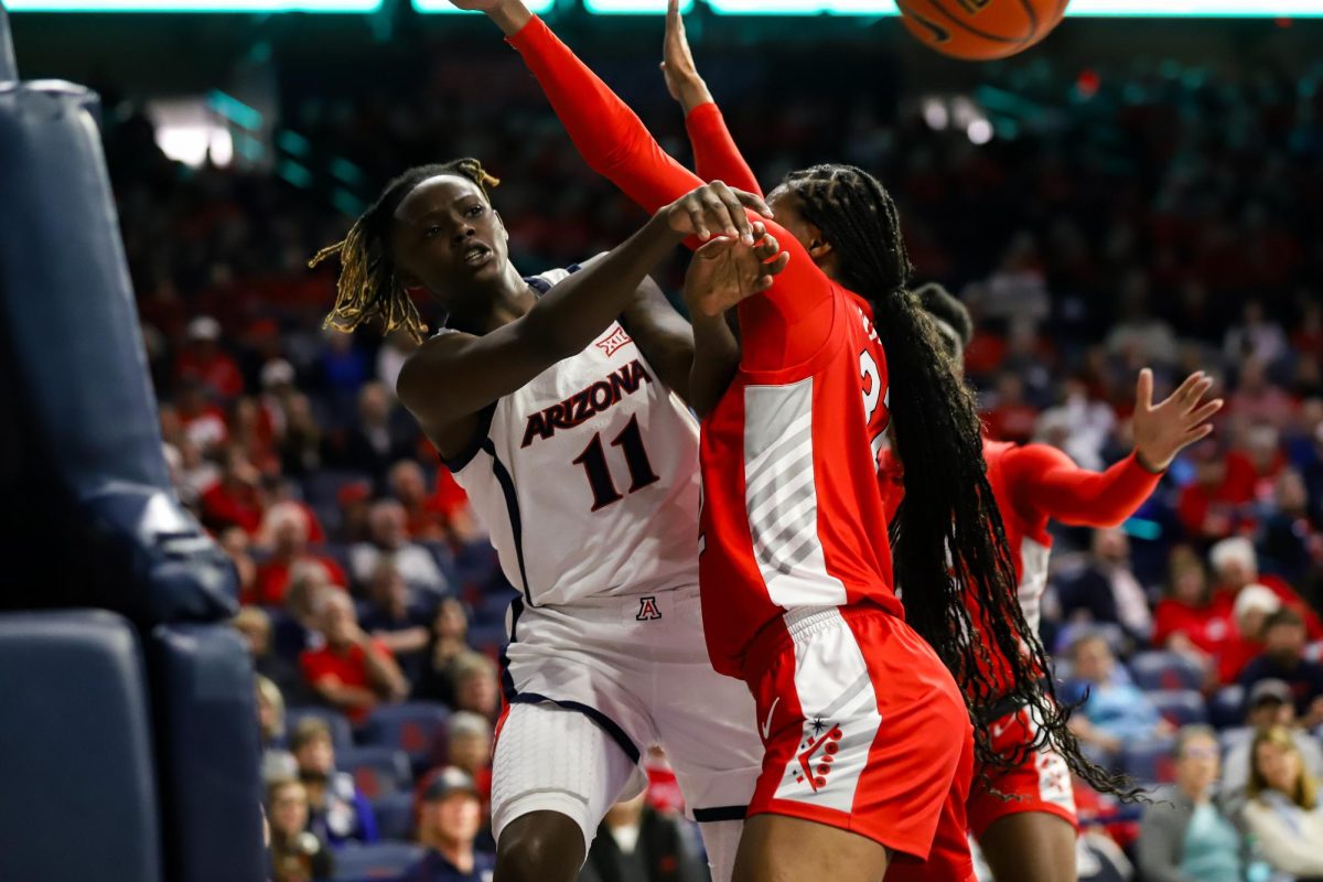 Sahnya Jah passes the ball in McKale Center on Nov. 12. Jah is a transfer from a South Carolina.