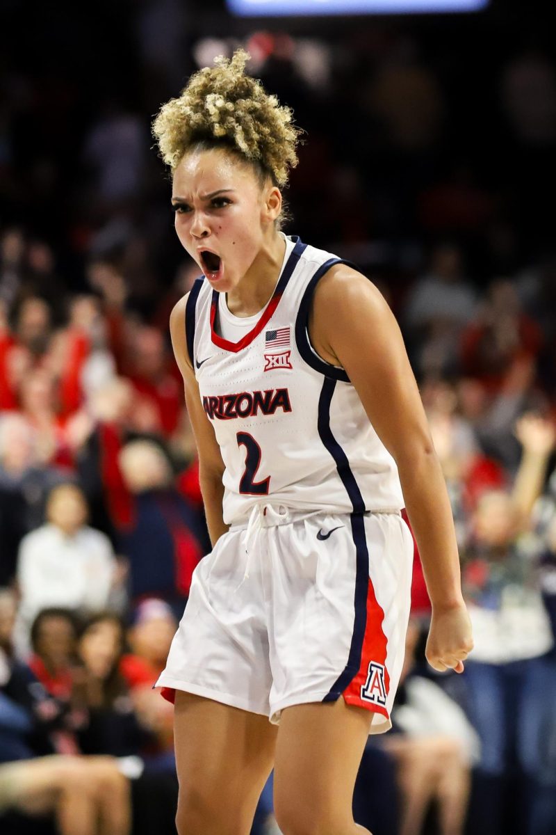 Jada Williams celebrates after making a three point shot to seal the game in McKale Center on Nov. 12. Williams scored 15 total points.