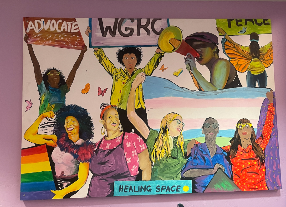 A sign hangs up in the lobby of the WGRC, deeming it a “healing space” for all on Nov. 6. The space is located in the Student Union Memorial Center in Room 404DD.
