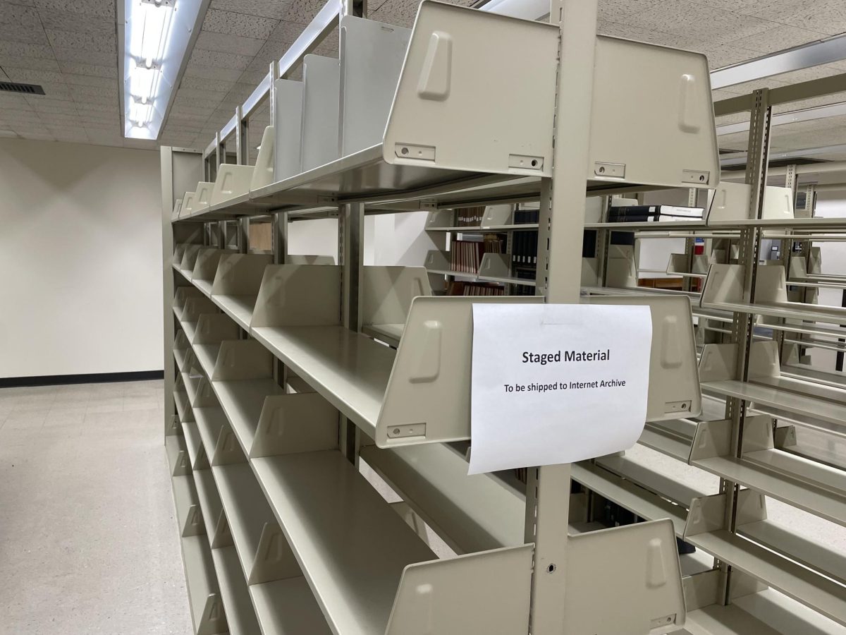 Empty bookshelves in the Albert B. Weaver Science and Engineering Library once held hard copies, which have now been replaced by digital online formats for UA students. 