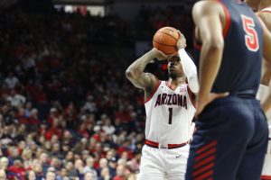 Fifth-year guard Caleb Love takes a shot from the free throw line in the Wildcats' game against Samford University on Dec. 18 in McKale Center. This season, Love has completed 89.7% of his free throws. 