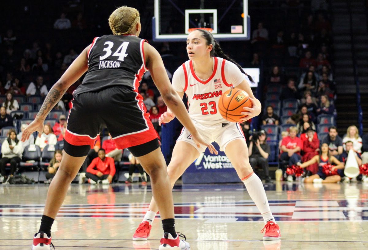 Paulina Paris of the Arizona Wildcats faces down Cincinnati Bearcat A'riel Jackson during their game on Jan. 22. in McKale. Paris scored 10 points in her 25 minutes on the court.