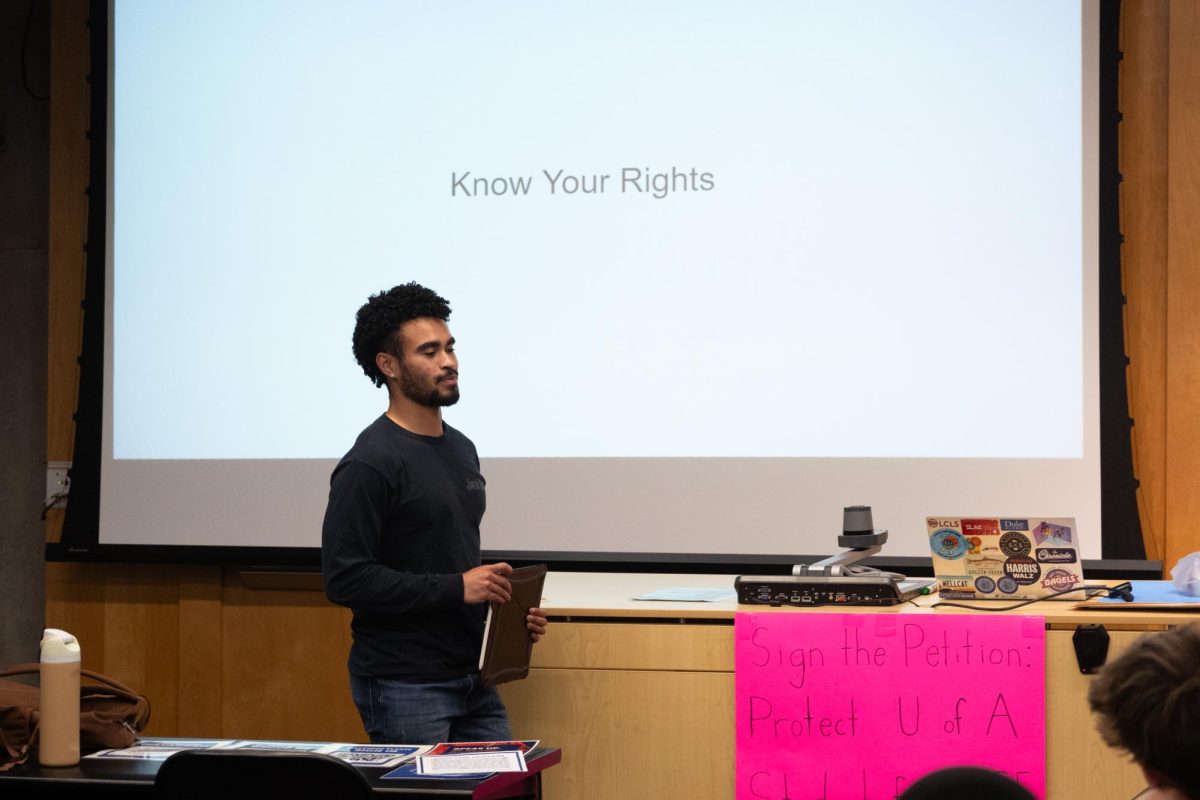 Justin Barnes gives a know your rights presentation at a College Democrats meeting on Feb. 6. The presentation focused on rights surrounding illegal searches and understanding what is in a police warrant.