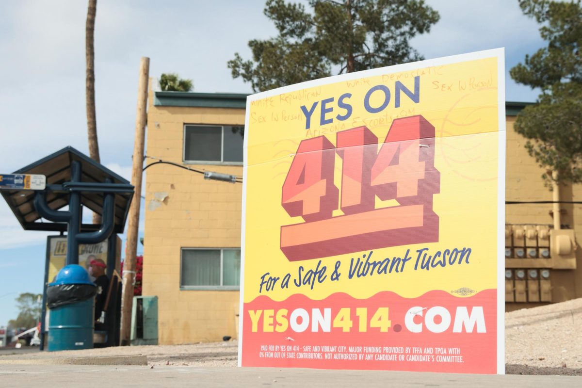 A sign tells votes to vote yes on proposition 414 in Tucson on March 6. Proposition 414's supporters say that 414 will help keep Tucson vibrant.