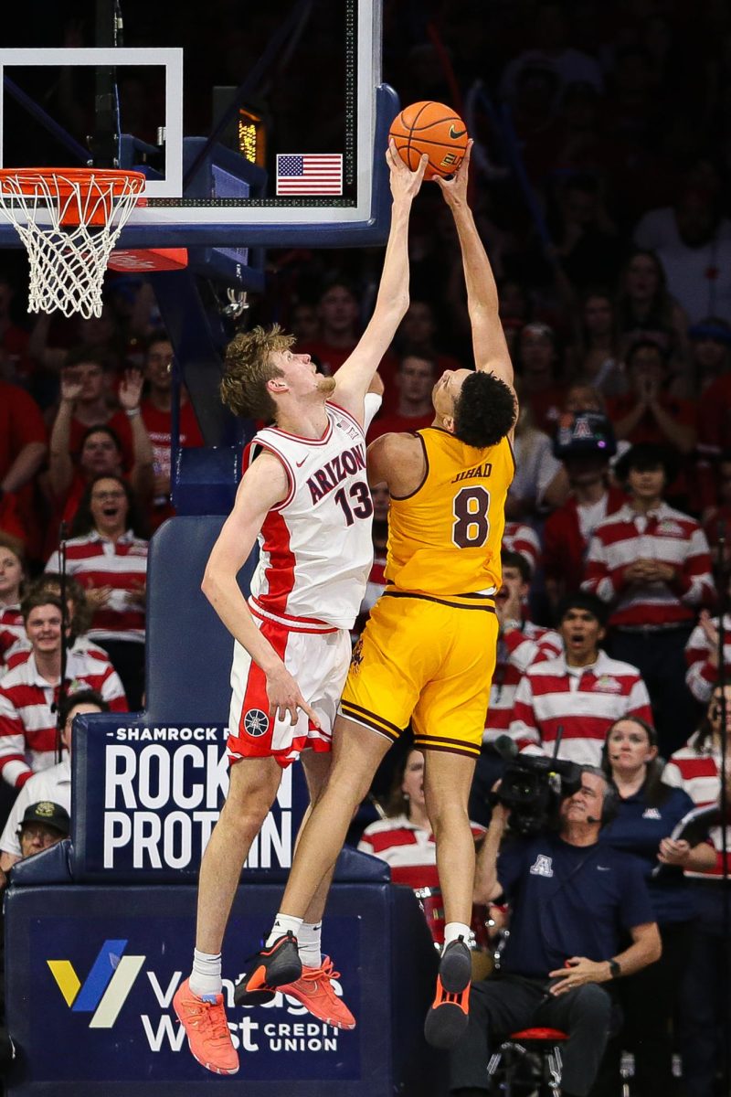 Henri Veesaar goes up for a block against Basheer Jihad. Veesaar scored a career-high for Arizona to lead with 22 points and eight rebounds. The Wildcats won 113-110 against ASU on Senior Night on Saturday, March 4.