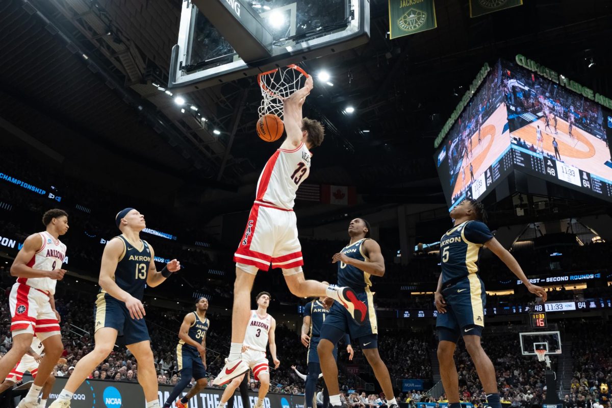 Henri Veesaar dunks the ball against the University of Akron during the first round of the NCAA Tournament in Climate Pledge Arena on March 21 in Seattle, Washington. The Wildcats came out swinging in the first round with a 93-65 victory.