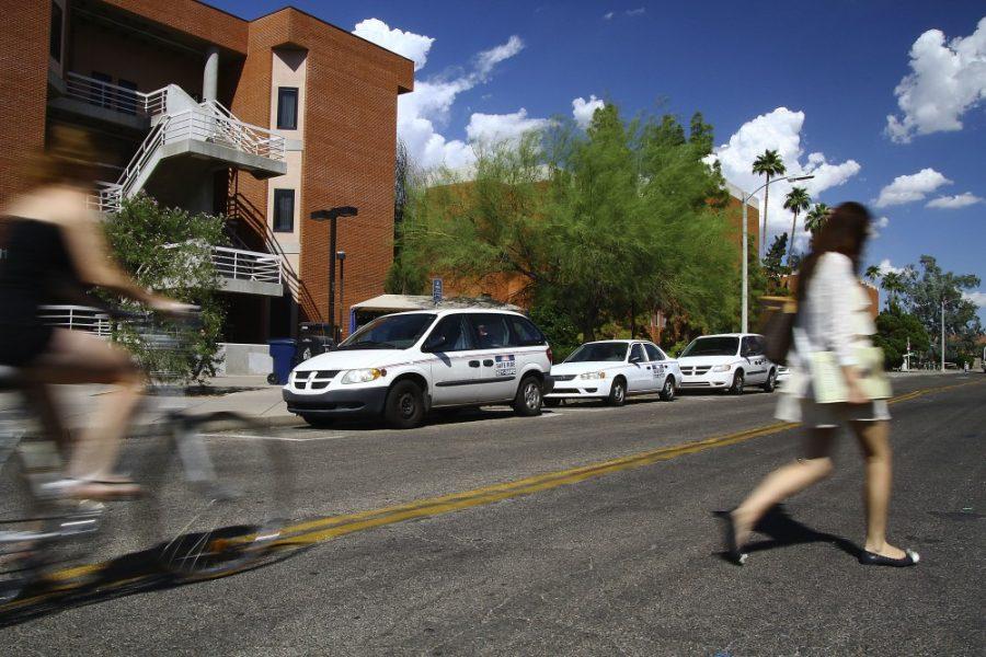 Gordon Bates / Arizona Daily Wildcat

Saferide cars are lined up on Second Street during the afternoon, waiting for their next evening of work on Thursday, Sept 8. Students are questioning if Tucson cab companies, or Safe Ride offer more punctual, readily available service.