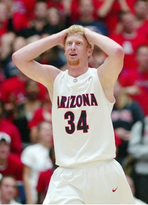 UA forward Chase Budinger reacts to a foul in Tuesday nights 72-71 loss to Alabama-Birmingham in McKale Center. The Wildcats wont advance to New York in the NIT Season Tipoff.