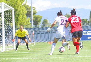 UA forward Sally Thurner, middle, dribbles the ball toward the net in a 2-1 win over California State Northridge at Murphey Stadium on Sept. 21. The Wildcats will play their last  nonconference game this weekend at Santa Clara.