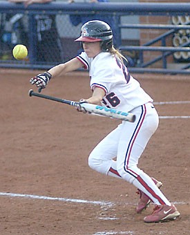 Senior outfielder Caitlin Lowe lays down a bunt in a win against Creighton March 5 at Hillenbrand Stadium. Lowe and the Wildcats put a 24 game home winning streak against ASU on the line today and tomorrow.