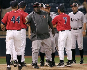 Major League Baseball Hall-of-Famer and current San Diego State head coach Tony Gwynn meets the Arizona coaching staff before Tuesdays 3-2 Wildcat win at Sancet Stadium. Gwynn was once a standout baseball player before playing for the San Diego Padres for 20 years.