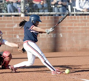 Arizona freshman left fielder Brittany Lastrapes swings away during the Wildcats 8-5 victory over the Canadian National Team on Feb. 27 at Hillenbrand Stadium. Lastrapes became an immediate contributor for the No. 7 Wildcats, hitting .333 with two home runs, 10 RBIs and three stolen bases in 15 games thus far.