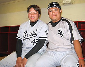 Steve Xiu, right, a music performance senior, was asked to translate for minor league pitcher Po-Yu Lin, left, last year. Since then Xiu has been trying to balance finishing his degree and working with Lin.