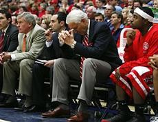Arizona head coach Lute Olson puts his head in his hands during the second half of No. 17 Arizonas game against No. 4 North Carolina Saturday in McKale Center. North Carolina beat Arizona 92-64, which is the highest margin of victory at McKale Center under Olson. 