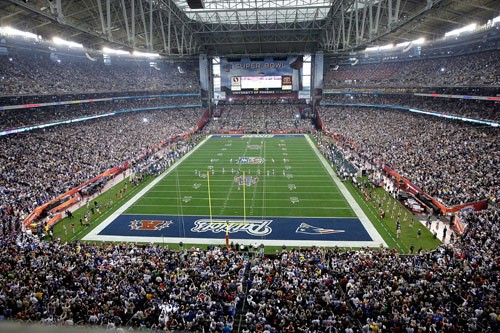 The New York Giants and New England Patritots face off on the opening kick at Super Bowl XLII at University of Phoenix Stadium in Glendale, Arizona, on Sunday, February 3, 2008, where the New England Patriots are trying to be the second undefeated team in NFL history. (Mark Cornelison/MCT)