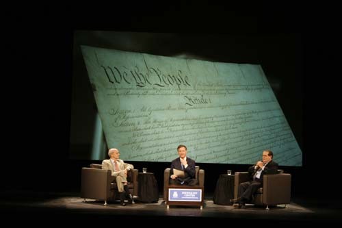 From left, Justice Stephen Breyer , NBC Justice correspondent Pete Williams , and Justice Antonin Scalia discuss their methods for interpreting the US Constitution during a debate at the Tucson Convention Center Leo Rich Theater yesterday. The event hosted by the James E. Rogers College of Law?s Rehnquist Center let community members and students have the chance to listen to the justices? opposing viewpoints and opinions on constitutional statutes, such as the interpretation of the second amendm